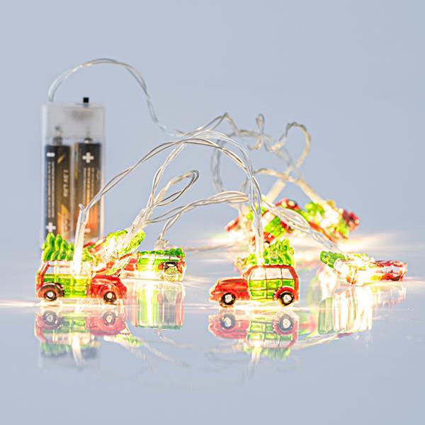 LÍNEA, 10 LED 5mm CON CARROS ACRÍLICOS 3,7cm, CAJA DE PILAS 2xAA, CABLE TRANSPARENTE, LED BLANCO CÁLIDO POR 10cm, CABLE 50cm, IP20