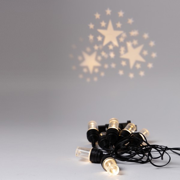 PROYECTOR GUIRNALDA 8 LED CON DISEÑO DE ESTRELLAS, ADAPTADOR DE 5V, FIJO, CABLE PVC NEGRO, LED BLANCO CÁLIDO, POR 50cm, CABLE 5m, IP44