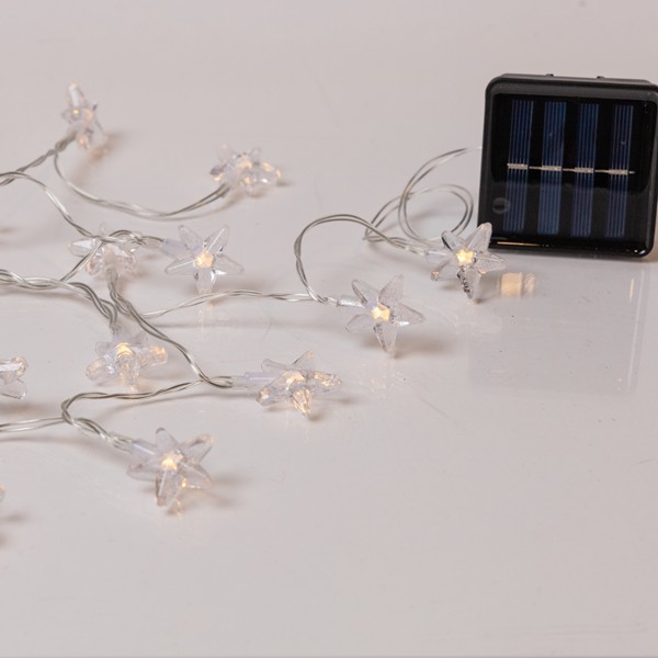 LÍNEA, 60 LED 5 mm, ESTRELLAS DE PLÁSTICO, PANEL SOLAR CON SENSOR DE LUZ, 8 Μ/F, CABLE DE PVC TRANSPARENTE, LED BLANCO CÁLIDO, POR 10 cm, CABLE DE CONDUCCIÓN 60 cm, IP44