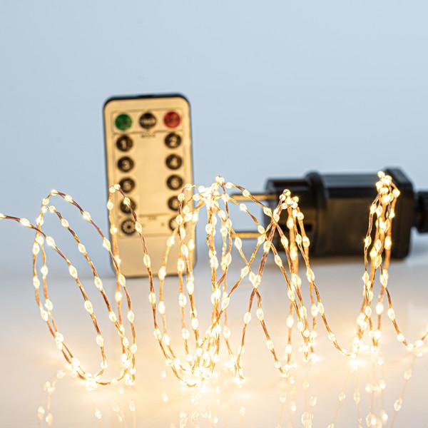 LÍNEA, 300 MINI LED, ADAPTADOR, CON CONTROL REMOTO (ENCENDIDO/APAGADO, TEMPORIZADOR, DIMMER), CABLE DE COBRE BRONCE, LED BLANCO CÁLIDO, POR 1,5 cm, CABLE DE CONDUCCIÓN 3 m, IP44