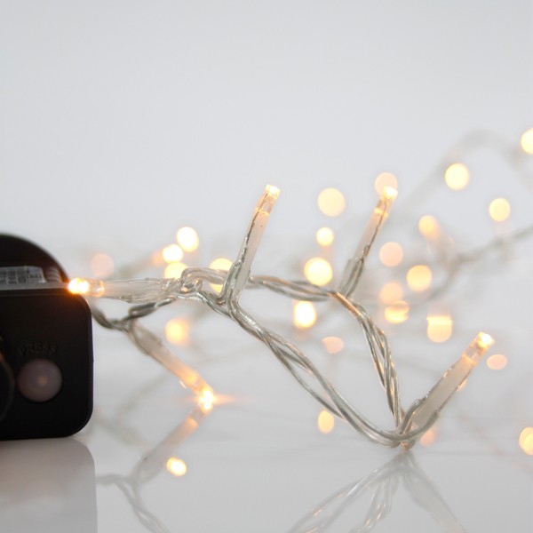 LÍNEA, 700 LED 3 mm, ADAPTADOR 31 V, 8 M/F Y MEMORIA, CABLE DE PVC TRANSPARENTE, LED BLANCO CÁLIDO POR 5 cm, CABLE DE CONDUCCIÓN 3 m, IP44