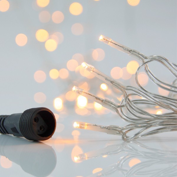 LÍNEA, 700 LED 3 mm, ADAPTADOR 31 V, 4 CONECTORES HASTA 2 JUEGOS, CABLE DE PVC TRANSPARENTE, LED BLANCO CÁLIDO, POR 5 cm, CABLE DE CONDUCCIÓN 3 m, IP44 (paquete en rollo)