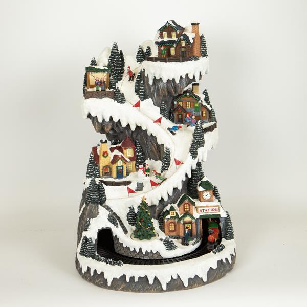 PUEBLO NAVIDEÑO CON PISTA DE ESQUÍ Y TREN, CON ADAPTADOR, CON MÚSICA Y MOVIMIENTO, 40x41,5x58,5cm
